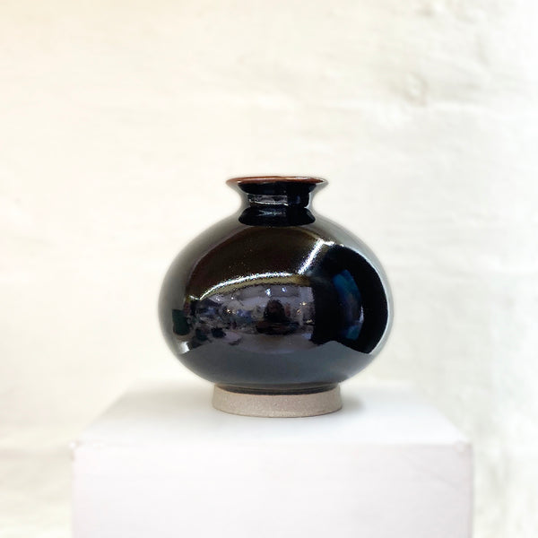 stunning stoneware bottleneck budvase by contemporary ceramicist Daniel Smyth glazed in a traditional Japanese glaze called tenmoku
