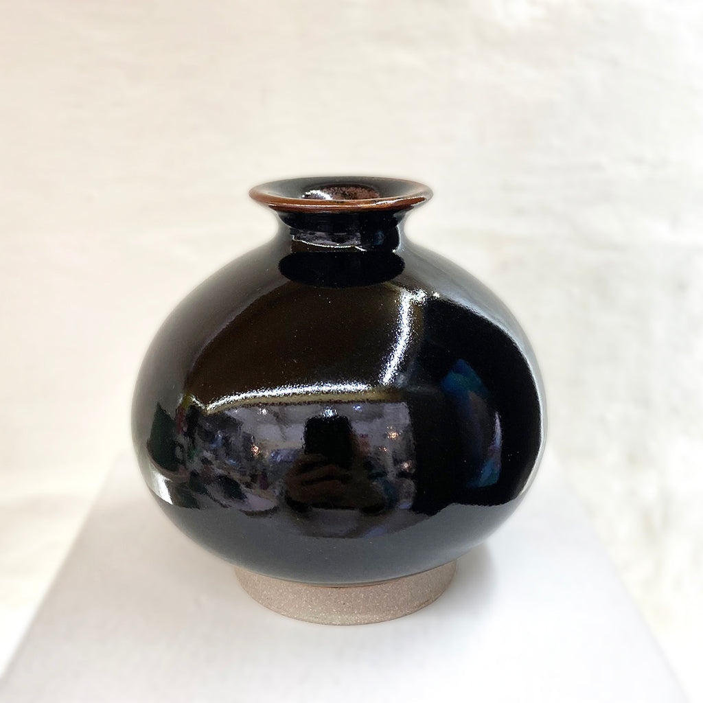 stunning stoneware bottleneck budvase by contemporary ceramicist Daniel Smyth glazed in a traditional Japanese glaze called tenmoku