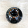 top view of stunning stoneware bottleneck budvase by contemporary ceramicist Daniel Smyth glazed in a traditional Japanese glaze called tenmoku