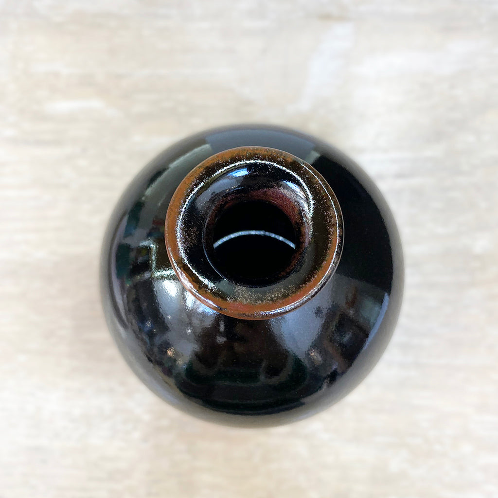 top view of stunning stoneware bottleneck budvase by contemporary ceramicist Daniel Smyth glazed in a traditional Japanese glaze called tenmoku