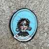 Textile Art Brooch Inspired by Vivienne Westwood by Michelle Holmes in turquoise. Punk woman image