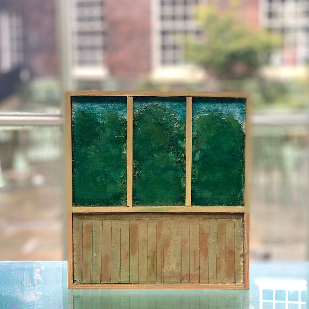 beautiful painting of a window from an old school house by Irish Artist Clement McAleer photographed against the window of the Bluecoat Display Centre