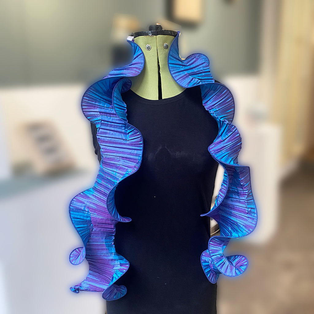 Two Tone Blue/Lilac Marty Scarf by Nawal Gebreel shown loose on a mannequin at the Bluecoat Display centre
