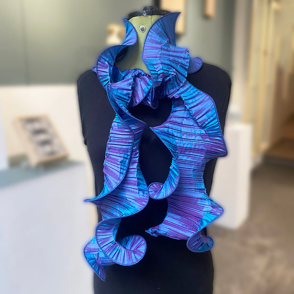 Two Tone Blue/Lilac Marty Scarf by Nawal Gebreel shown tied on a mannequin at the Bluecoat Display centre
