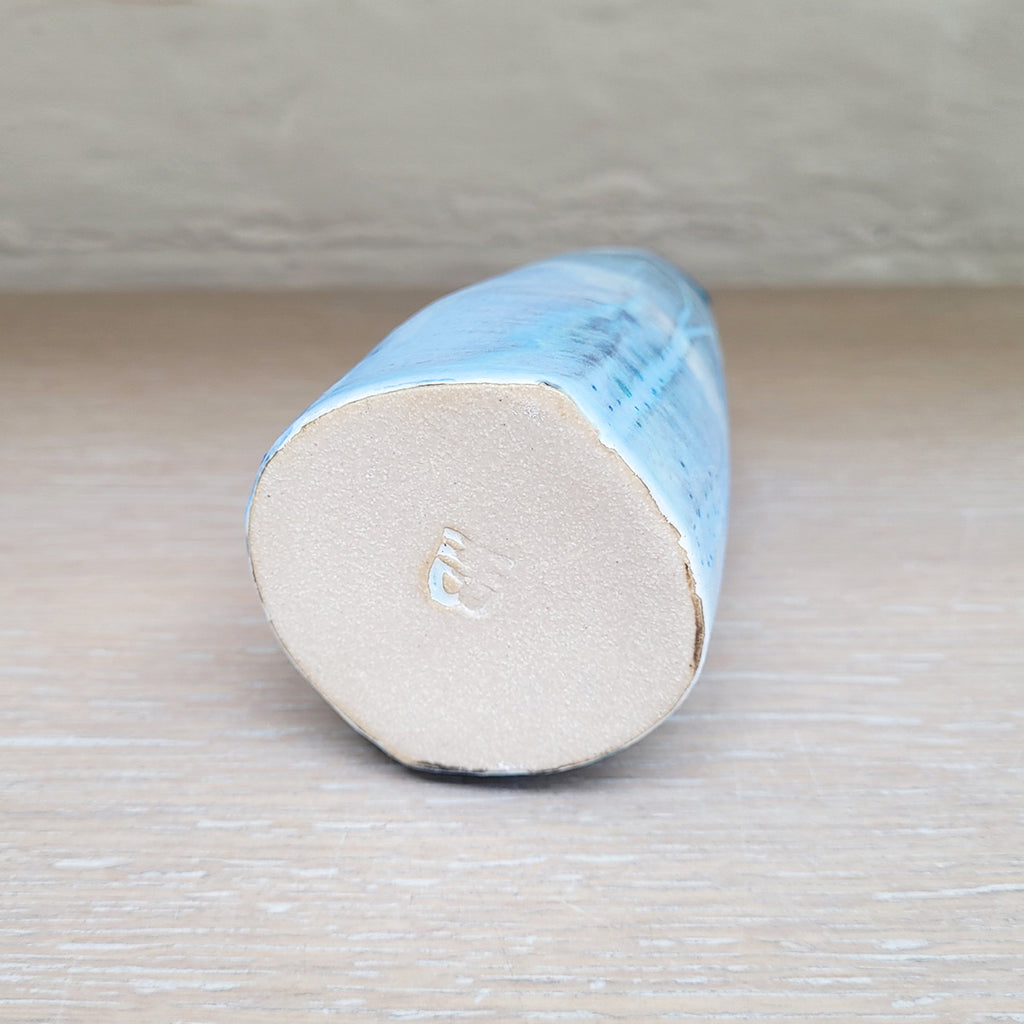 base of a contemporary ceramic woodland vase showingm makers mark of Kirsti hannah brown

