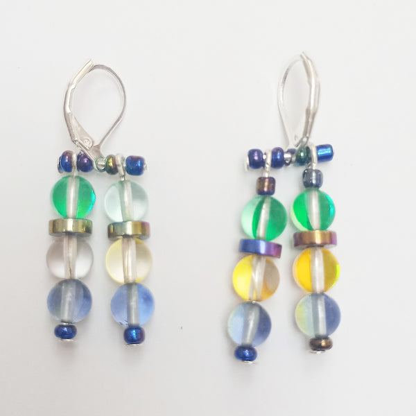 beautiful dyed quartz triple bead earrings with two strands and feature various glass beads in green, gold and blue on Sterling silver fittings